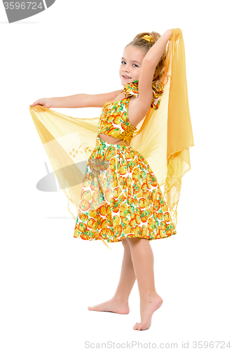 Image of Little Girl in a Yellow Dress with Shawl Posing