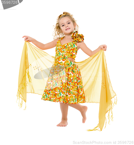 Image of Little Girl in a Yellow Dress with Shawl Posing