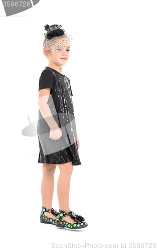 Image of Little Girl in a Black Dress Posing