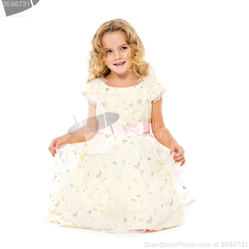 Image of Little Girl in a Light Dress Posing