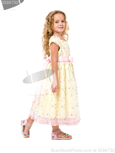 Image of Little Girl in a Light Dress Posing