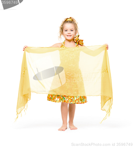 Image of Little Girl in a Yellow Dress with Shawl Posing