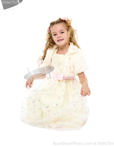 Image of Little Girl in a Light Dress Posing