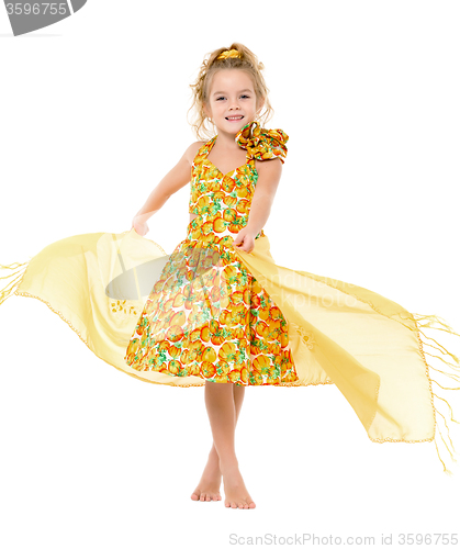 Image of Little Girl in a Yellow Dress with Shawl Posing