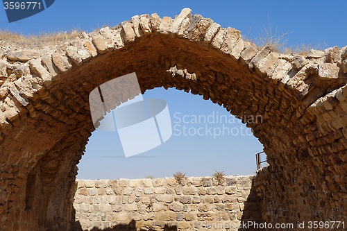 Image of Ancient stone arch and wall of Kerak Castle in Jordan
