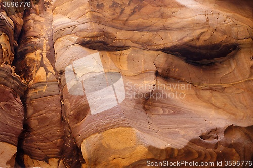 Image of Red striped rock texture in Wadi Mujib canyon in Jordan