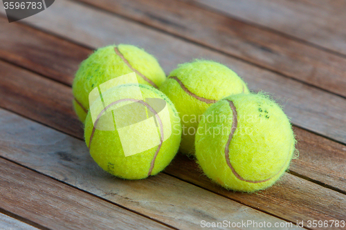 Image of Four tennis balls 