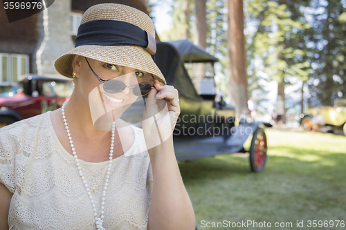 Image of 1920s Dressed Girl Near Vintage Car Outdoors Portrait