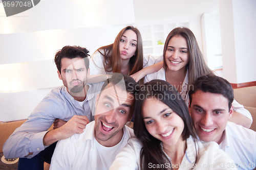 Image of group of friends taking selfie