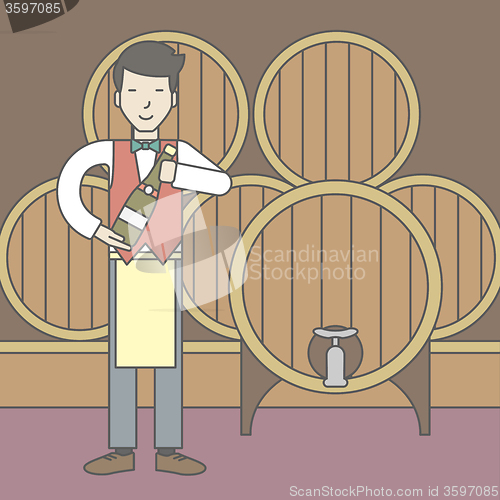 Image of Waiter in wine cellar.