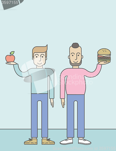 Image of Men standing with hamburger and apple.