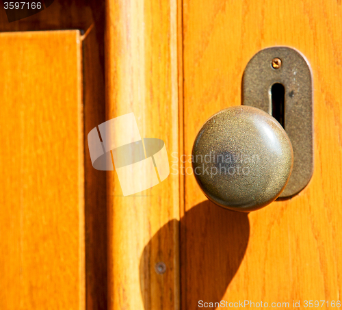 Image of stripped paint  door    in italy   ancian wood and traditional  