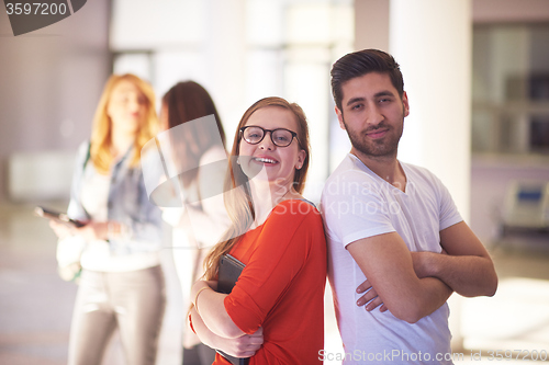 Image of students couple standing together