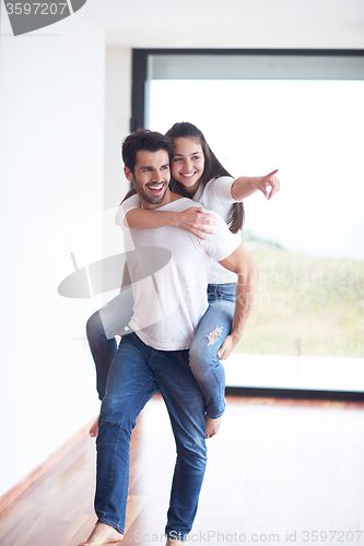 Image of happy young romantic couple have fun and  relax at home