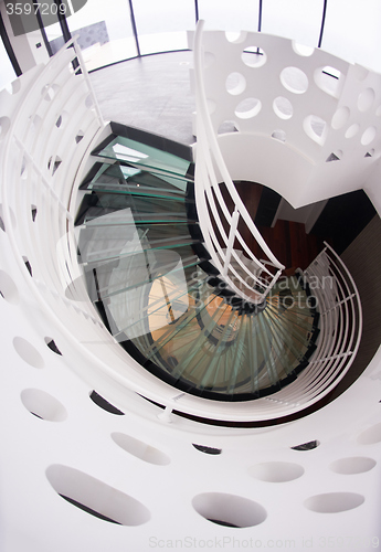 Image of modern glass spiral staircase