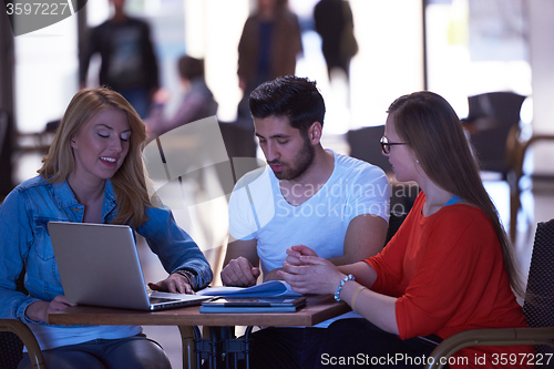Image of students group working on school  project  together