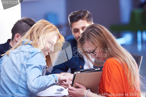 Image of students group working on school  project  together