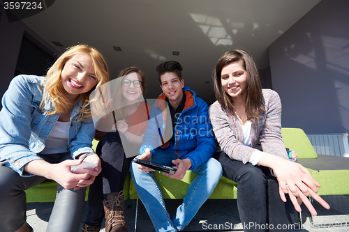 Image of students group working on school  project  together