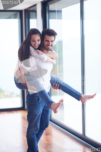 Image of happy young romantic couple have fun and  relax at home