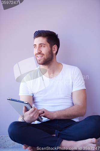 Image of student working on tablet