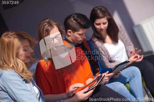 Image of students group working on school  project  together
