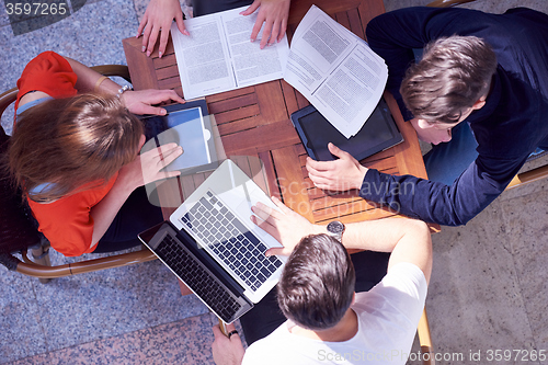 Image of students group working on school  project  together