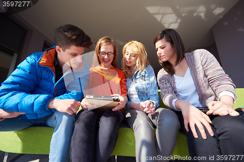 Image of students group working on school  project  together