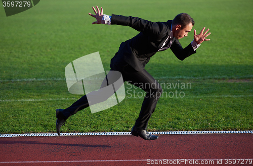 Image of business man ready to sprint