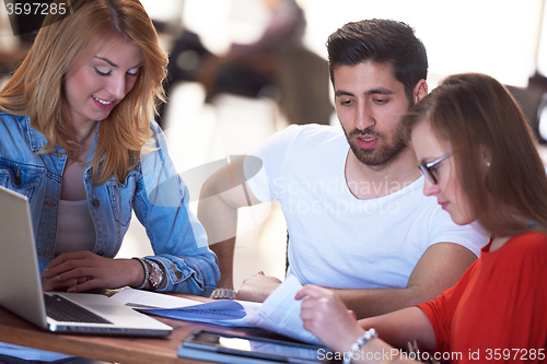 Image of students group working on school  project  together