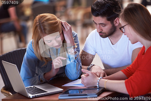 Image of students group working on school  project  together