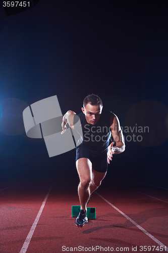 Image of Sprinter leaving starting blocks