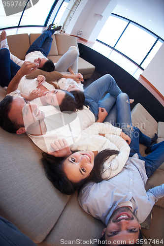 Image of friends group get relaxed at home