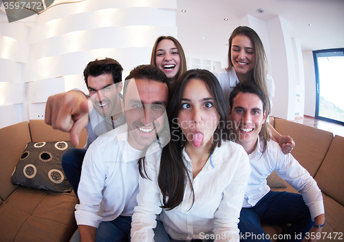 Image of group of friends taking selfie