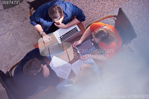 Image of students group working on school  project  together