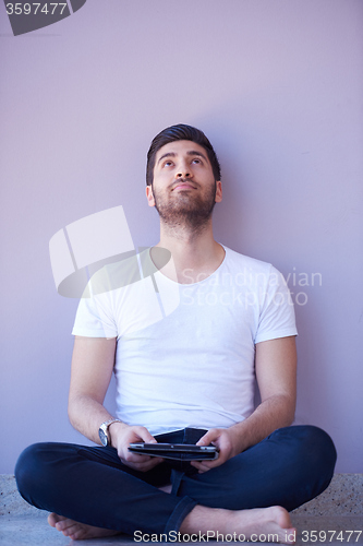 Image of student working on tablet