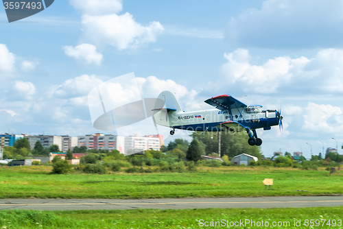 Image of antonov an 2 airplane flies up, lands