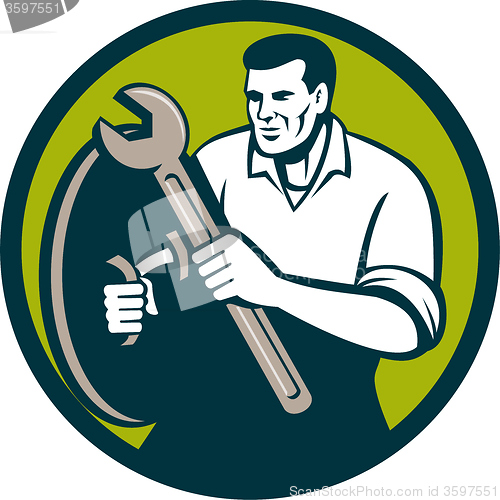 Image of Mechanic Brandishing Spanner Wrench Circle Retro