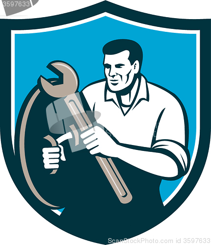 Image of Mechanic Brandishing Spanner Wrench Shield Retro