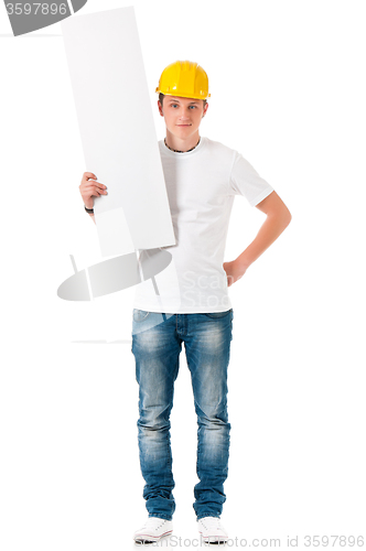 Image of Businessman in hard hat with blank