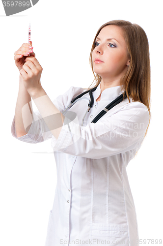 Image of Beautiful young nurse with syringe