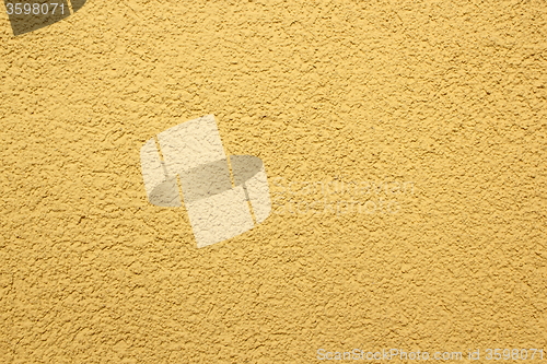Image of real yellow plaster texture