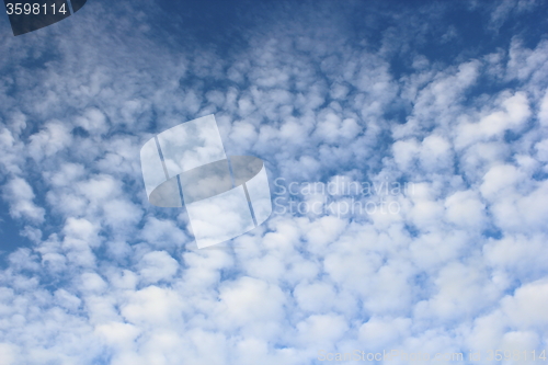 Image of beautiful tiny clouds on sky background