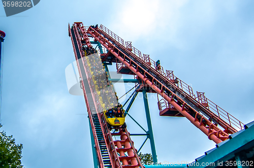 Image of crazy rollercoaster rides at amusement park