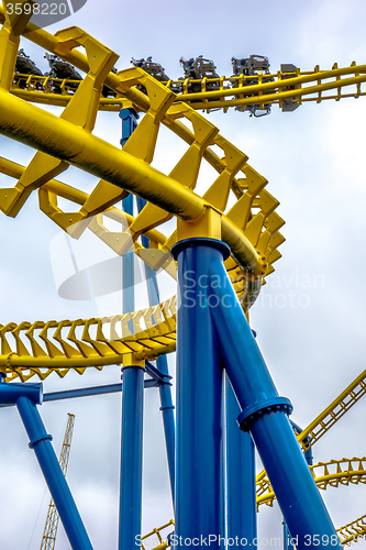 Image of crazy rollercoaster rides at amusement park