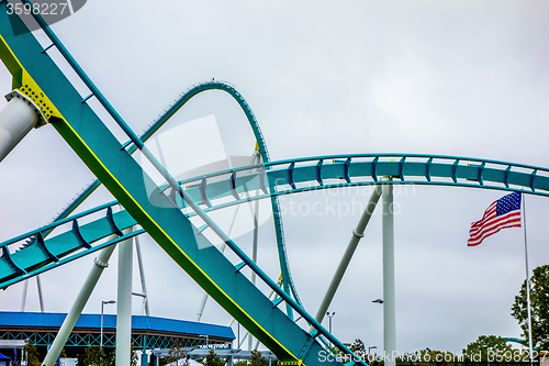 Image of crazy rollercoaster rides at amusement park