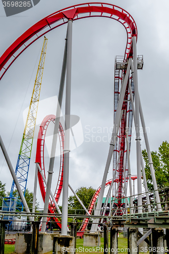 Image of crazy rollercoaster rides at amusement park