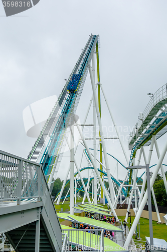 Image of crazy rollercoaster rides at amusement park