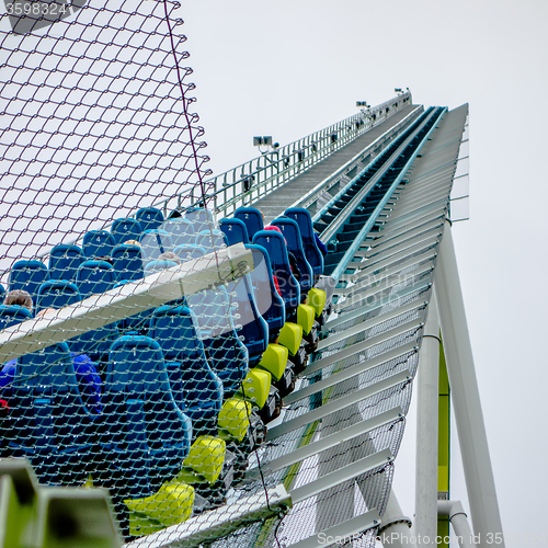 Image of crazy rollercoaster rides at amusement park