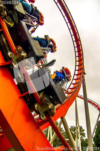 Image of crazy rollercoaster rides at amusement park