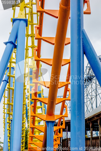 Image of crazy rollercoaster rides at amusement park